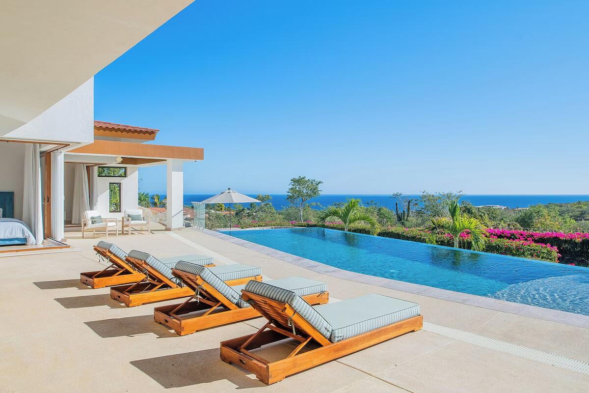Cabo Golf Fundadores Casa Primavera is a luxurious single-level 8-bedroom villa with stunning ocean and golf course for sale