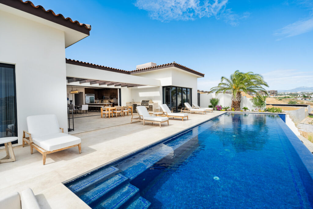Cabo Golf Palmilla Estates Discover a standout investment opportunity in coveted Palmilla Estates, where relaxed coastal style meets refined comfort. This single-story 3-bedroom, 3-bath home blends natural stone, warm wood beams, and a gourmet kitchen with high-end appliances, breakfast nook, and full bar. A generous entry courtyard opens to a heated pool, jacuzzi, outdoor kitchen, and a sun-washed yard overlooking the 9th fairway of the Jack Nicklaus Mountain Course. Eligible for a golf membership, it also makes an effortless vacation retreat with close access to Palmilla Beach, world-class amenities, and the charming San José town center. for sale