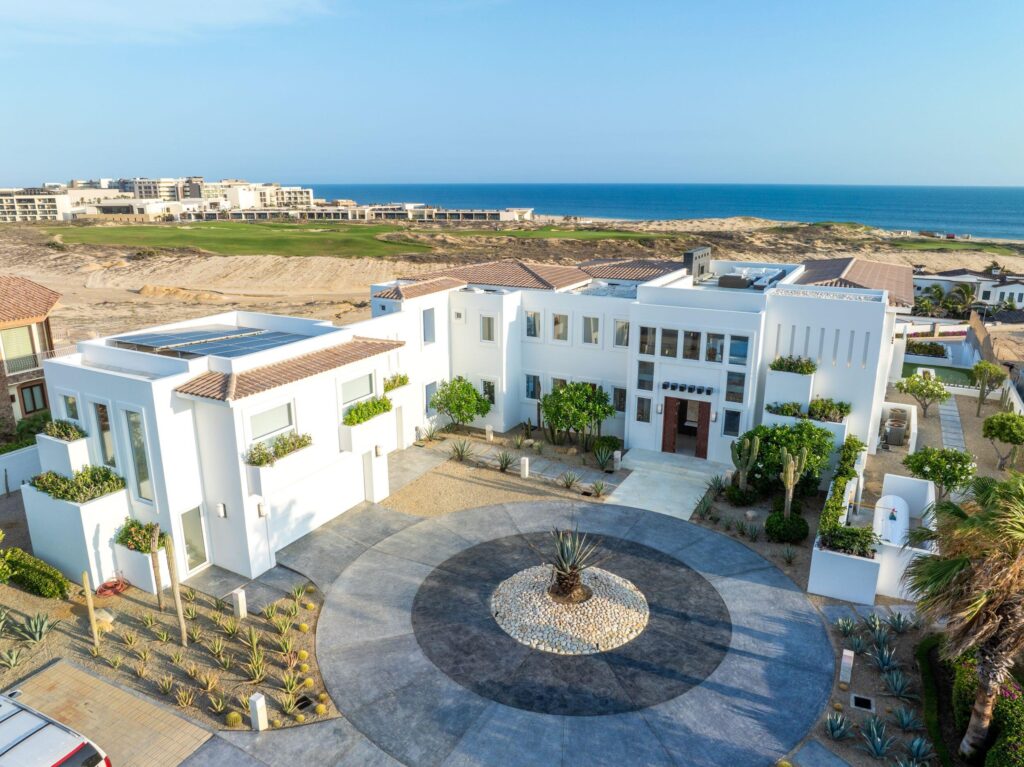 Cabo Golf Beach Estates Luz de Diamante is perfectly situated just a short walk from the beach and nestled within the prestigious Diamante community positioned between the 5th and 16th holes of the Dunes Course designed by Davis Love III. Spanning approximately 20,000 sqft, this magnificent residence, built in 2017, seamlessly blends modern design with Mexican accents. The estate boasts four spacious master bedrooms, each providing stunning ocean for sale