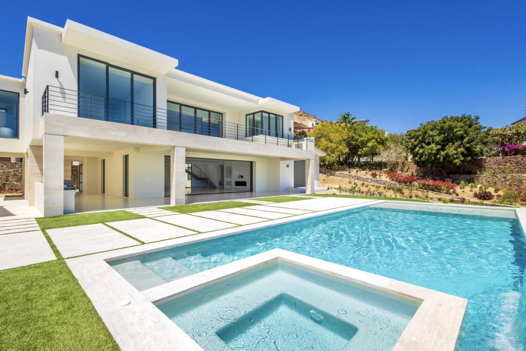 Cabo Golf Section 18- Horizontes Welcome to Horizontes 3, an exquisite custom-made home located within San José del Cabo's most sought-after community, Querencia. Surrounded by Tom Fazio's signature golf course, recognized as one of the best in the country, this stunning residence is just a short golf cart ride from the prestigious 5-star Club House.This remarkable 6-bedroom, 6.5-bathroom home elevates luxury living with a fresh vision of architecture and design. The layout features a cozy family room, an expansive bunk bed bedroom on the lower level, and a spacious maid's quarters with an independent entrance, making it ideal for entertaining family and friends. The property boasts expansive outdoor living spaces, including tranquil green areas, an outdoor kitchen, an infinity pool, a jacuzzi, and breathtaking mountain for sale