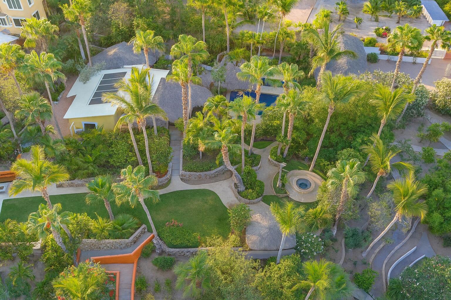 Cabo Golf Oasis Palmilla Located on the exclusive cul-de-sac of Palmilla Park, Casa Pitaya is one of four homes in this sough-after enclave.The residence features five en-suite bedrooms with private terraces. The gourmet kitchen connects to indoor and outdoor living spaces, including a veranda with a pool, spa, firepit, and dining areas overlooking golf, mountains, and ocean vistas. Additional highlights include a family room, two-car garage, smart home technology, and solar readiness. Perfectly located within Palmilla, it offers direct access to The Commons, Arroyo Park, El Once golf course, plus eligibility for memberships in Club Ninety-Six. for sale