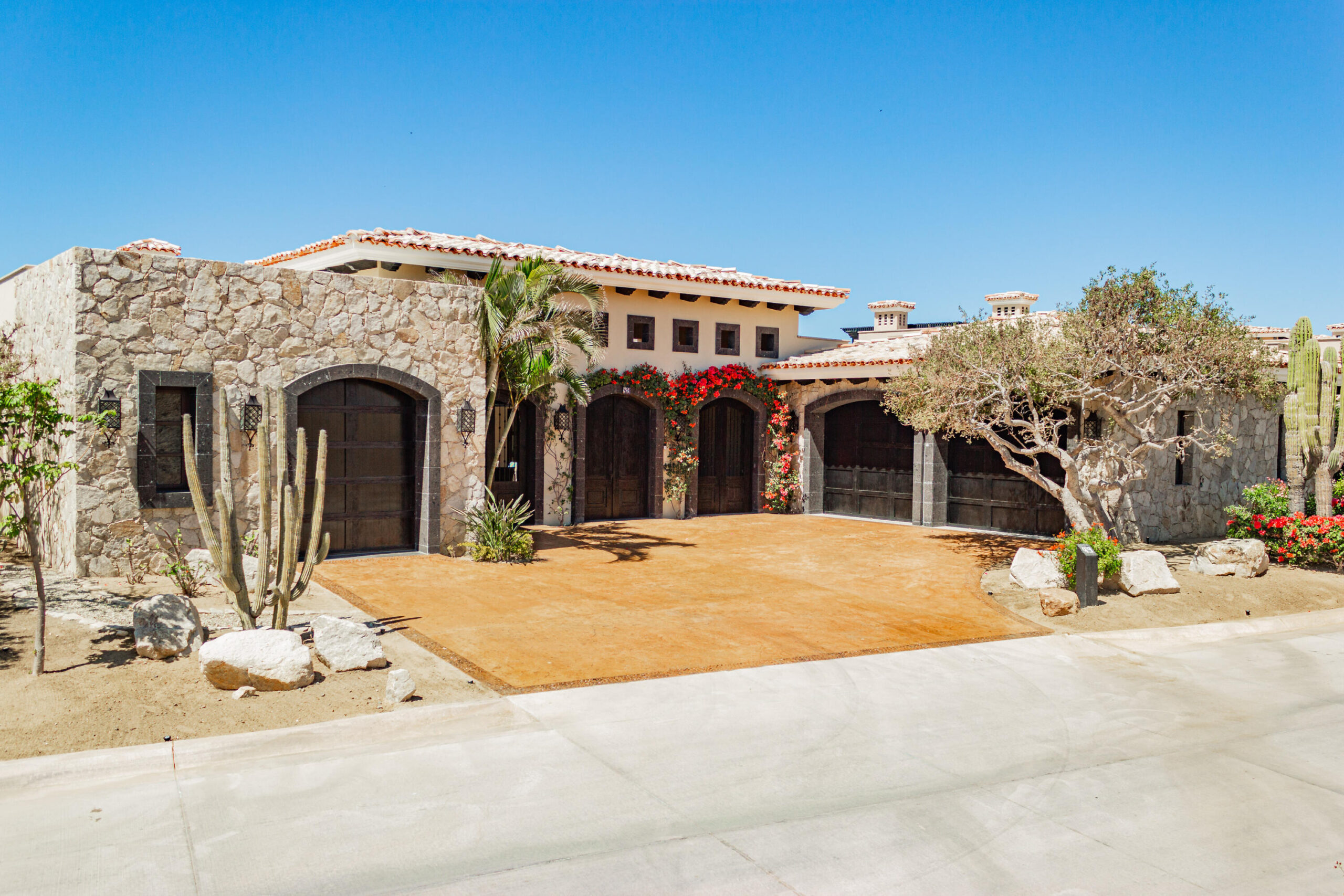 Cabo Golf Section 18- Horizontes Welcome to Horizontes 3, an exquisite custom-made home located within San José del Cabo's most sought-after community, Querencia. Surrounded by Tom Fazio's signature golf course, recognized as one of the best in the country, this stunning residence is just a short golf cart ride from the prestigious 5-star Club House. This remarkable 6-bedroom, 6.5-bathroom home elevates luxury living with a fresh vision of architecture and design. The layout features a cozy family room, an expansive bunk bed bedroom on the lower level, and a spacious maid's quarters with an independent entrance, making it ideal for entertaining family and friends.The property boasts outdoor living spaces, including tranquil green areas, an outdoor kitchen, an infinity pool, a jacuzzi, and ocean and ravine for sale