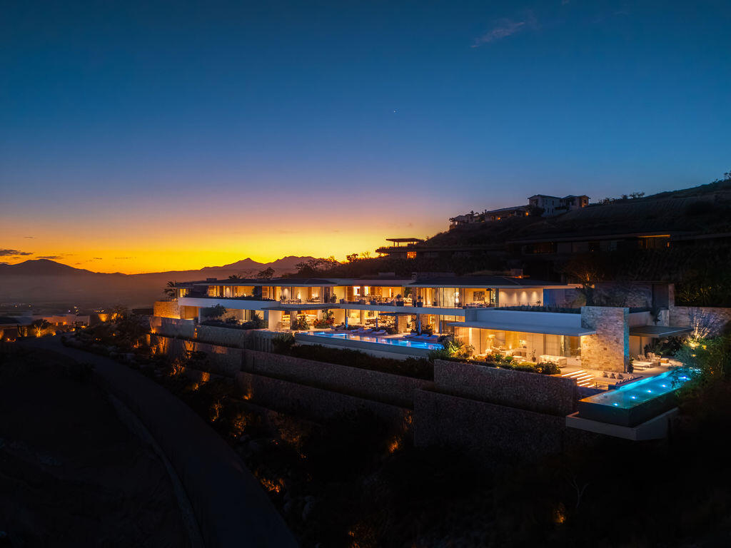 Cabo Golf Section 18- Horizontes Welcome to Horizontes 3, an exquisite custom-made home located within San José del Cabo's most sought-after community, Querencia. Surrounded by Tom Fazio's signature golf course, recognized as one of the best in the country, this stunning residence is just a short golf cart ride from the prestigious 5-star Club House. This remarkable 6-bedroom, 6.5-bathroom home elevates luxury living with a fresh vision of architecture and design. The layout features a cozy family room, an expansive bunk bed bedroom on the lower level, and a spacious maid's quarters with an independent entrance, making it ideal for entertaining family and friends.The property boasts outdoor living spaces, including tranquil green areas, an outdoor kitchen, an infinity pool, a jacuzzi, and ocean and ravine for sale