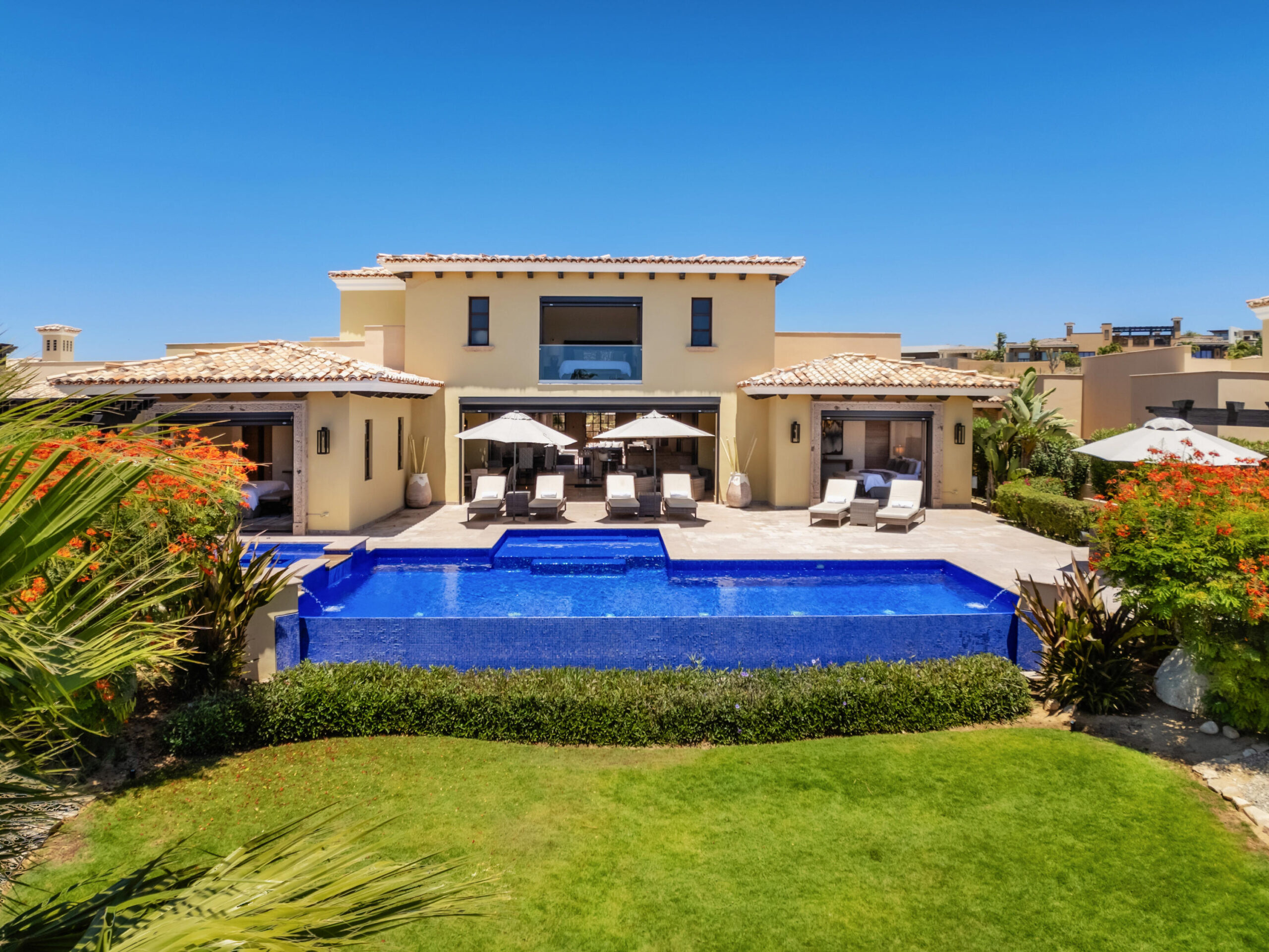 Cabo Golf Golf Villas Overlooking the Tiger Woods designed Oasis 12-hole Short Course within Diamante Cabo San Lucas, this unique six-bedroom, six-bathroom contemporary hacienda-style residence offers a seamless blend of comfort, design, and natural surroundings.Upon entry, a private central courtyard welcomes you, with bedrooms thoughtfully arranged around it, creating both privacy and a strong sense of connection. The home flows naturally into an open-concept great room, where the kitchen, dining, and living areas come together around a warm fireplace, all opening onto a covered terrace.Designed to embrace Cabo's for sale